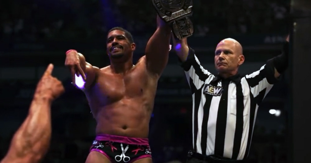 Anthony Bowens being hailed the AEW tag team championship.