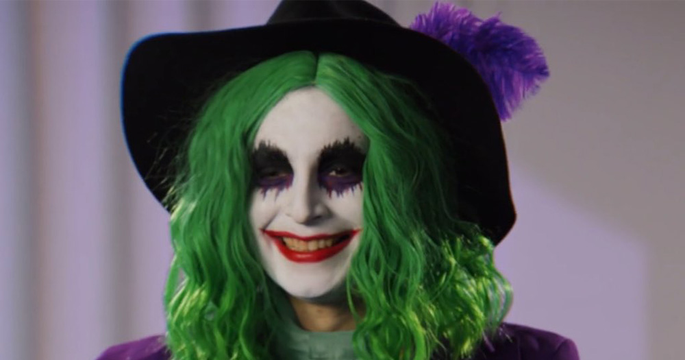 an image of the main character in The People's Joker. The person is dressed exactly like the Joker, the famous Batman villain.