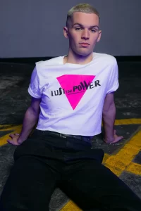 A model wearing a 'Lust For Power' t-shirt from the new GCN collection.