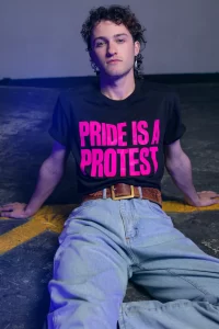 A model in a 'Pride is a protest' t-shirt from the new GCN collection.
