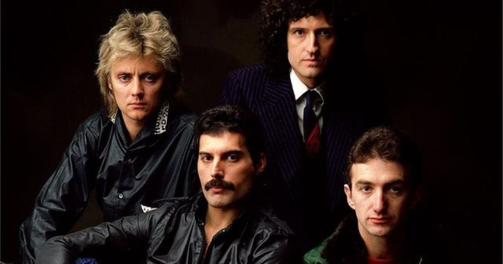 Photo of the four members of Queen - Freddie Mercury, Brian May, Roger Taylor and John Deacon