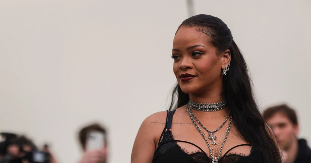 An image of Rihanna, rumoured to produce songs for Black Panther 2,posing for a photo.