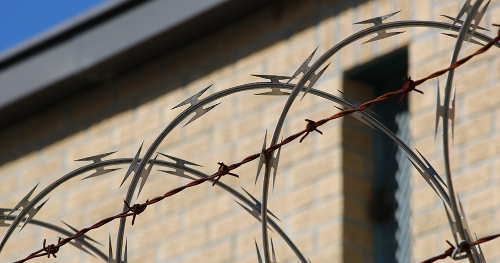 Barbed wire at a jail where a man is being sent for assaulting Transgender sex workers.