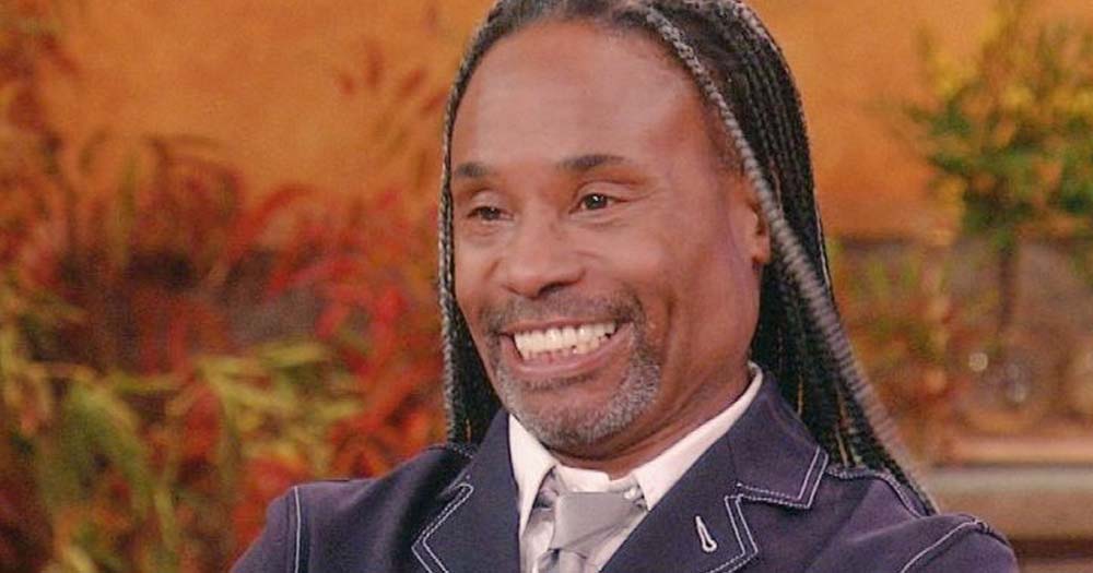 Billy Porter smiles at camera wearing a black suit, he will be honored with a Hollywood Walk of Fame star on December 1st!