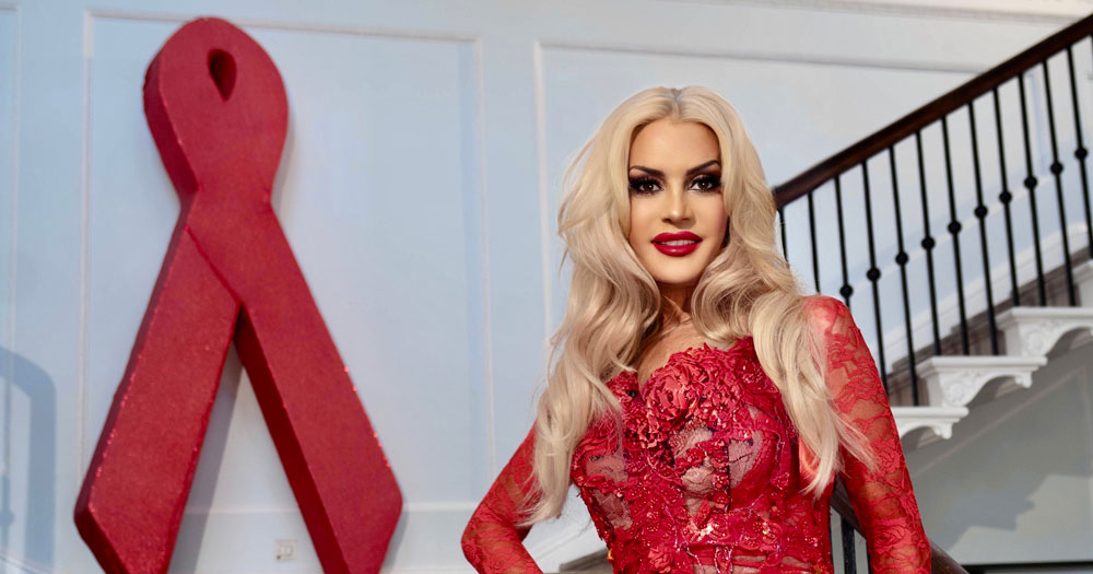 Photo of Rebecca Tallon de Havilland, ambassador for the GLOW RED campaign by HIV Ireland, and an HIV red ribbon.