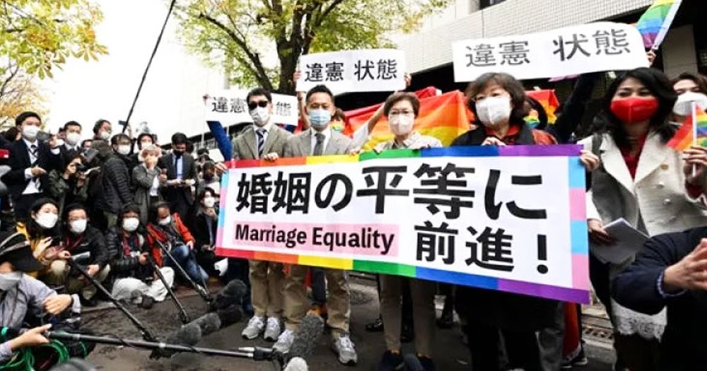 A group of plaintiffs who brought a legal challenge to a same-sex marriage ban in Japan, holding a banner that reads 'marriage equality'.