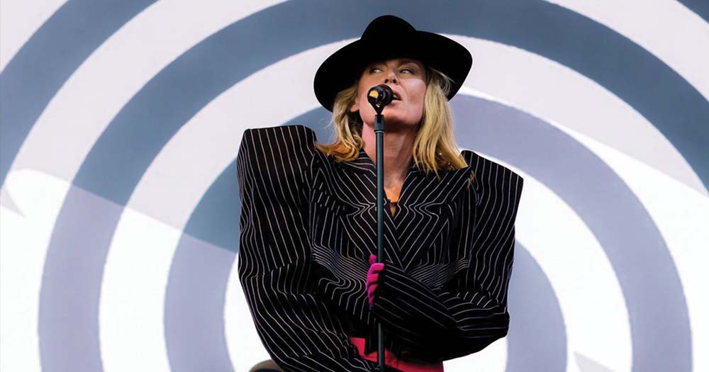 Roisin Murphy performing in black hat and suit in an ad announcing her tour and GCN is doing a ticket giveaway!