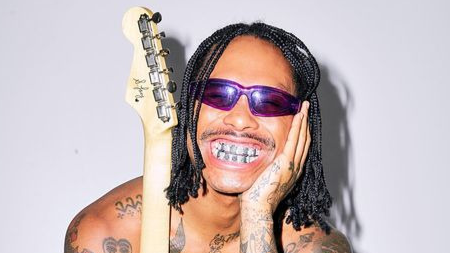 Steve Lacy smiles as he is an LGBTQ+ icon nominated for a 2023 Grammy.