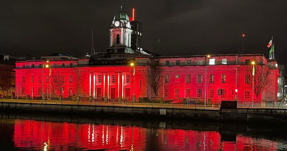 Cork City Hall in red light, as part of a campaign in Ireland on World AIDS Day.