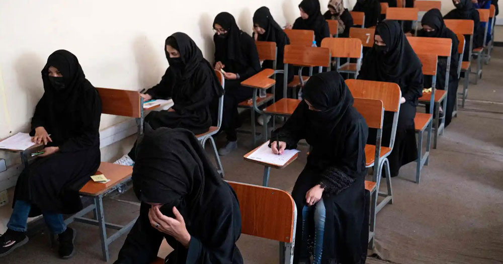 Women in a school in Afghanistan, where women have been banned from attending university.