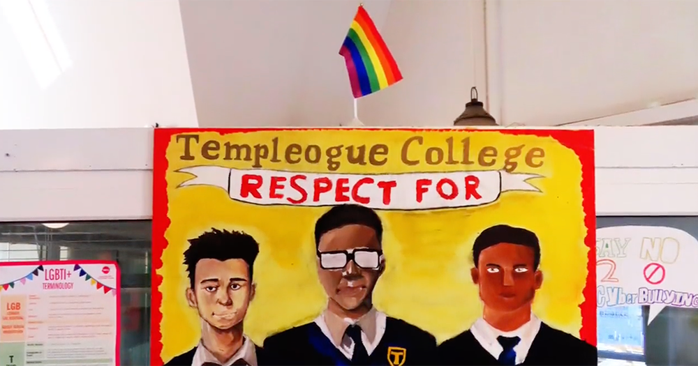 A painting at Templeogue College with a Pride flag on top.