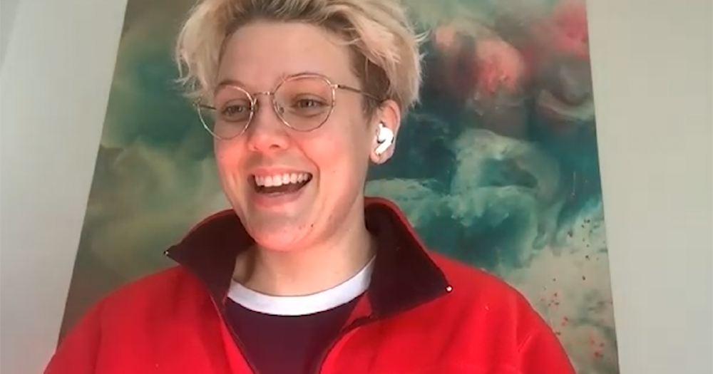 Betty Who smiling during a Zoom interview.