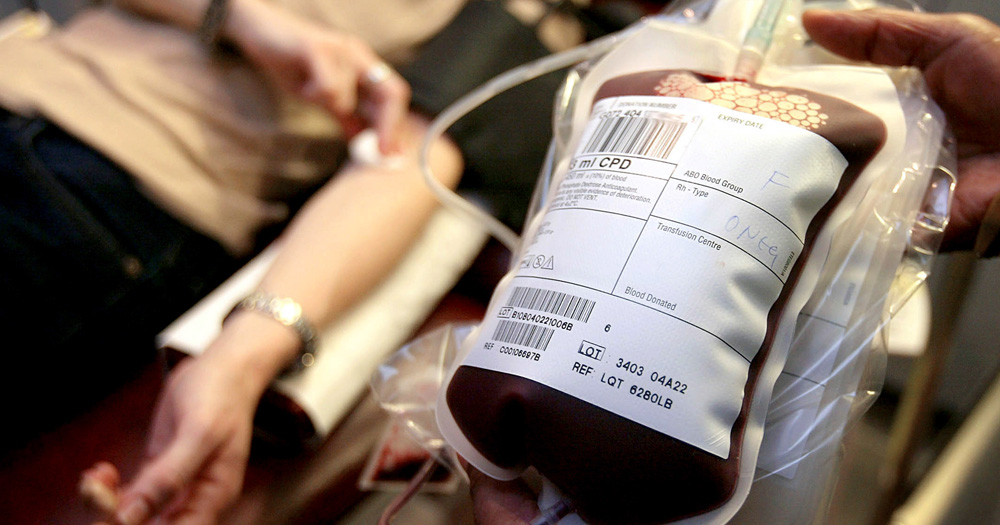 A photo of someone donating to help increase blood supplies.