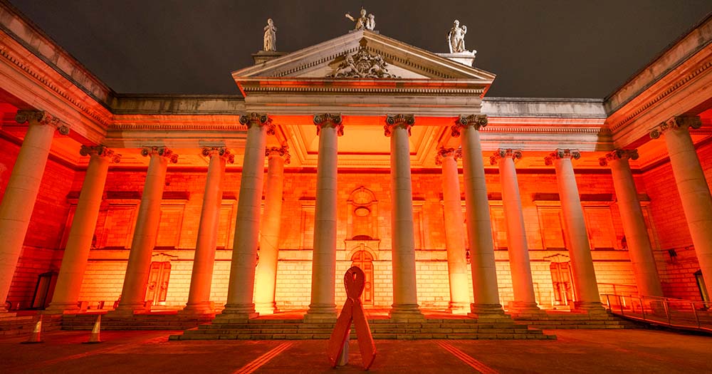 Dublin City building glows red in honor of HIV awareness while HIV rates have doubled in Ireland in the past year.
