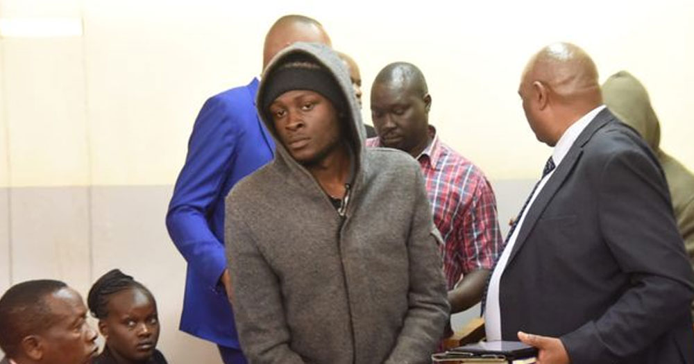 Jackton Odhiambo, who si a suspect in the murder of Edwin Chiloba, being escorted in court.
