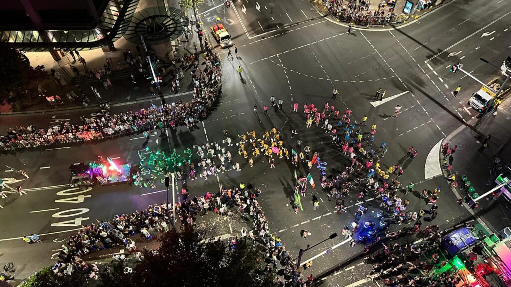 Aerial view of Sydney Queer Irish marching in Mardi Gras.