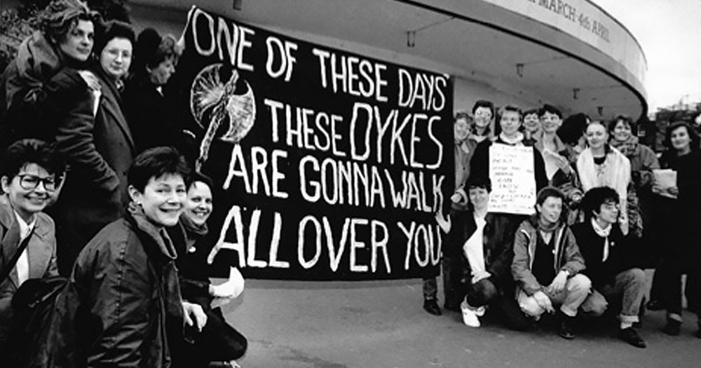 This article is about lesbian activists who protested against Section 28. In the photo, a group of lesbian activists protesting in Manchester holding a banner that reads "One of these days these dykes are gonna walk all over you".