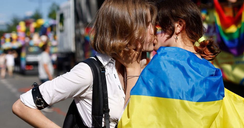 Two LGBTQ+ Ukrainians kissing.