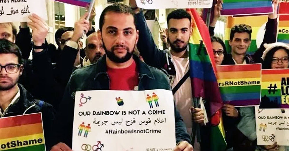 LGBTQ+ people protesting in Egypt, where the police is using dating apps to lure and arrest them.