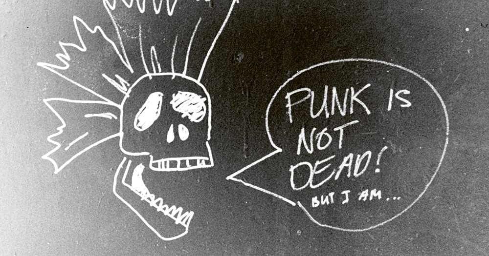 Illustration of a skull with a mohawk and speech bubble reading: 