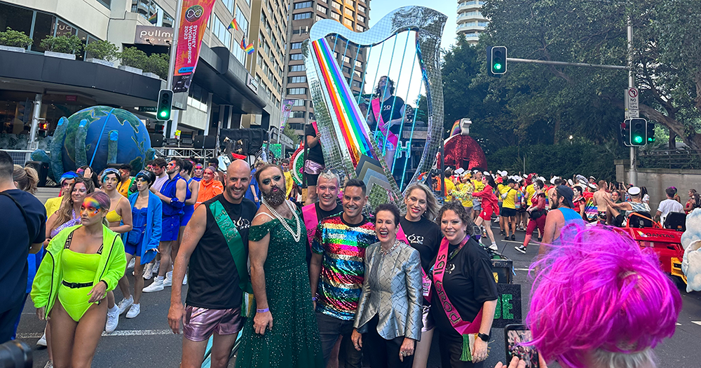 Sydney Queer Irish in front of their float at Mardi Gras 2023.