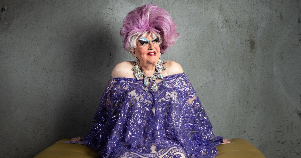 A photo of drag performer Darcelle XV sitting.