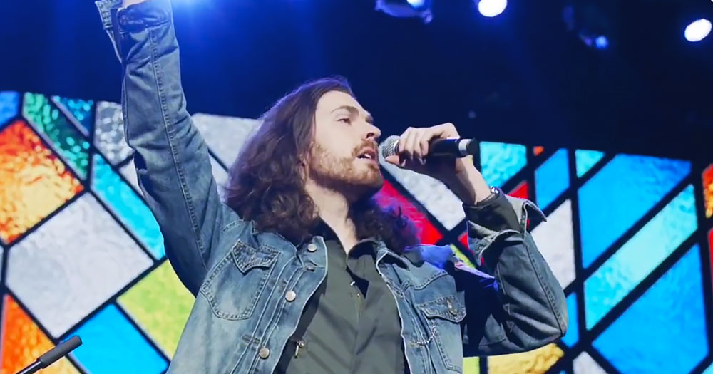 Hozier performing at a benefit concert in Tennessee.