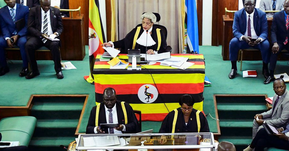 This article is about a Ugandan bill criminalising homosexuality. In the photo, Ugandan MPs discussing in parliament.