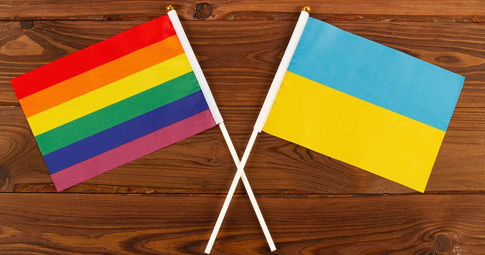 A Pride same-sex love flag and Ukraine flag.