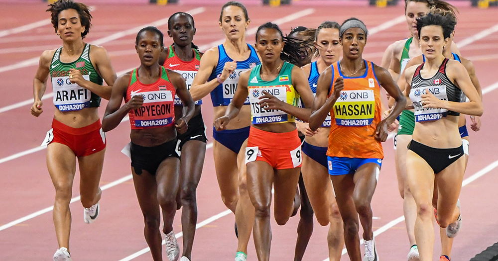 A group of women racing in a World Athletics event.