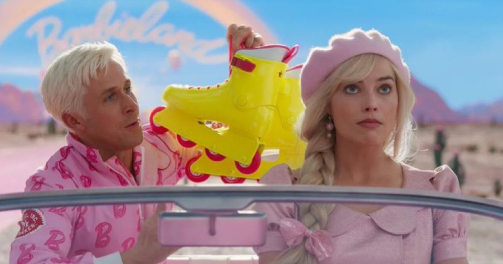 Ryan Gosling and Margot Robbie sit in a convertable in a scene from Greta Gerwig’s Barbie movie full of LGBTQ+ representation and queer references.