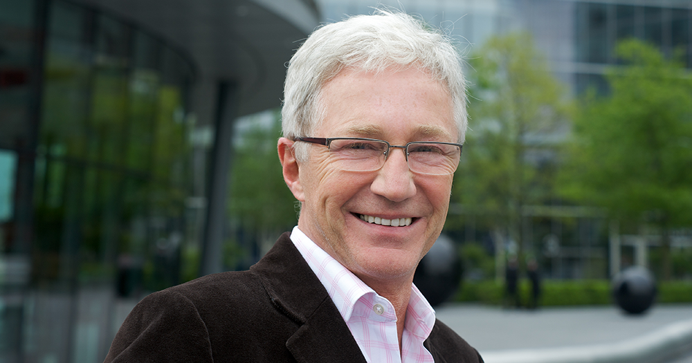 Portrait of Paul O'Grady, the subject of a new documentary, smiling.