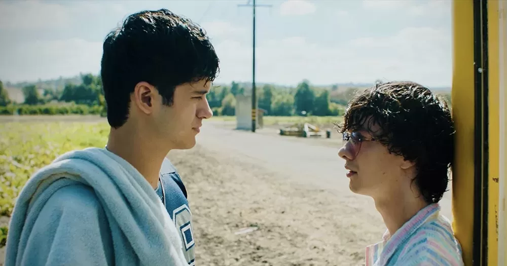 Screenshot from trailer of Aristotle and Dante, with the two protagonist facing each other.
