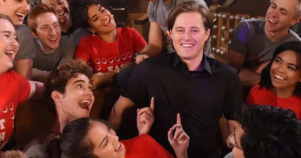 Lucas Grabeel with the cast of High School Musical: The Musical: The Series