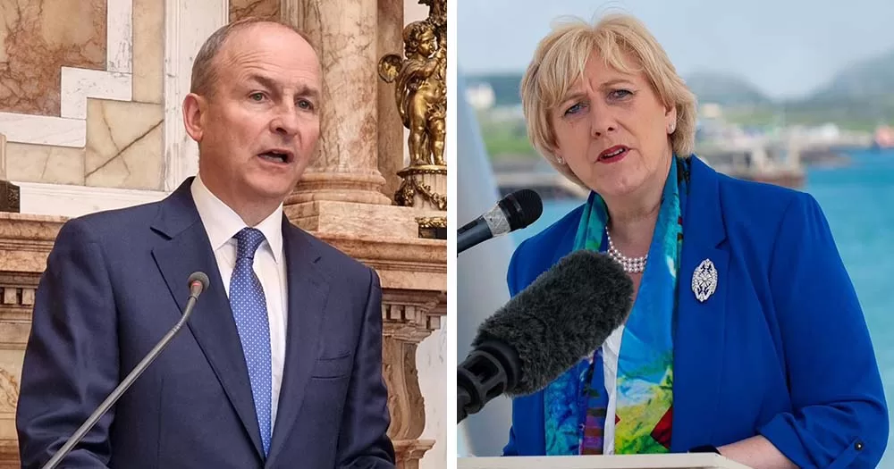 Ministers Micheal Martin and Heather Humphreys speak into microphones, they recently condemned people for intimidating Ireland library staff. 