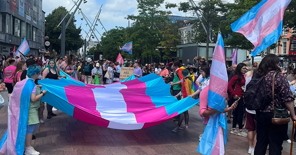 A photo of marchers and flags at Trans+ Pride Cork.