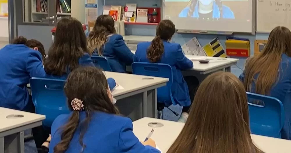 Students in blue uniforms sit at desks; new LGBTQ+ inclusive leaving cert curriculum will begin in September 2024