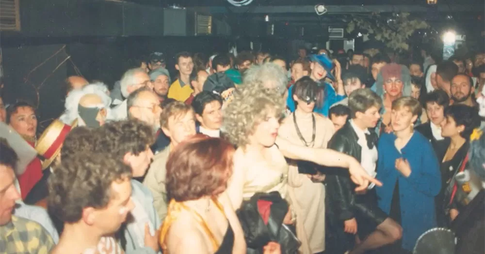 An image from the dancefloor of Flikkers in Dublin. It shows a big crowd of extravagantly dressed customers.