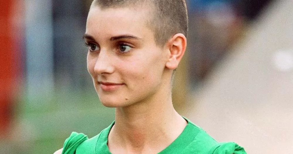 close-up photo of sinead o'connor wearing a green t-shirt