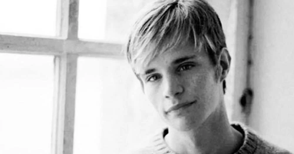 Black and white photo of Matthew Shepard looking toward camera. Yesterday marked the 25th anniversary of the brutal murder of Matthew Shepard.