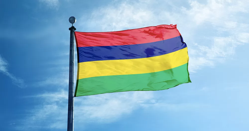 Flag of Mauritius, where homosexuality has been decriminalised, with the sky in the background.