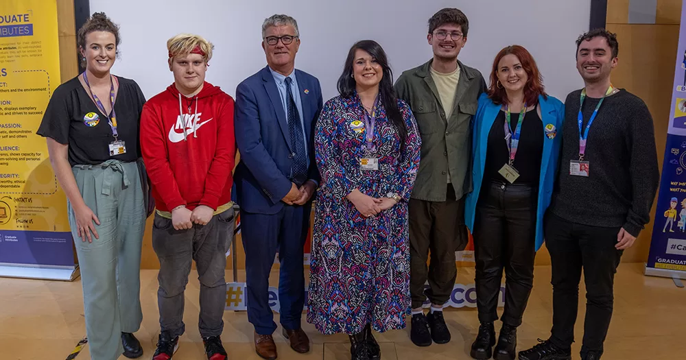 Image from the launch of the new UCC network for LGBTQ+ allies. Seven people are pictured side-by-side smiling and looking directly at the camera.