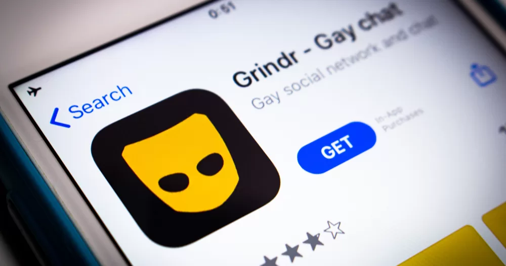 This article is about Grindr Unwrapped in Ireland. In the photo, a phone screen showing the Grindr app.