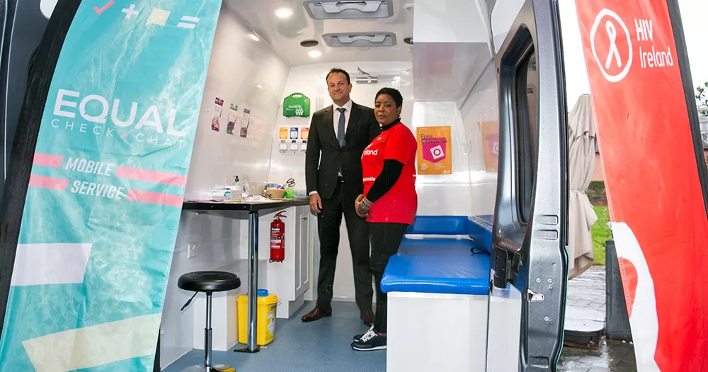 Leo Varadkar and a healthcare worker pose for a photo inside the new mobile HIV and STI screening service for Leinster.