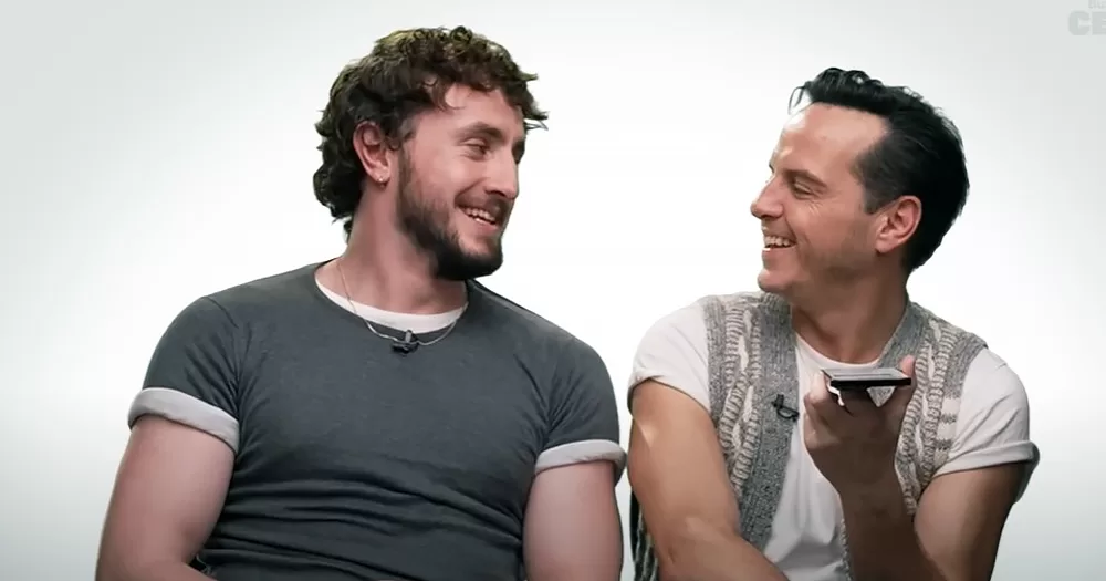 Paul Mescal and Andrew Scott during a Costar interview with Buzzfeed, facing each other and laughing.