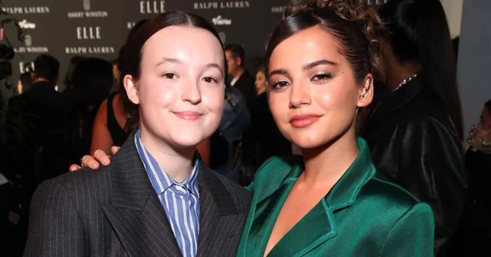 Photo of Bella Ramsey and Isabela Merced dressed in suits, they play sapphic love interests in The Last of Us