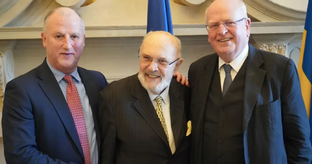 David Norris after delivering his final speech in the Seanad, posing with two other Senators.