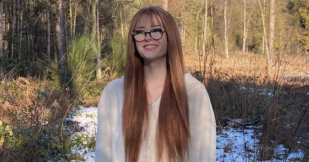 Photo of Brianna Ghey, whose murderers have been sentenced, smiling with trees in the background.