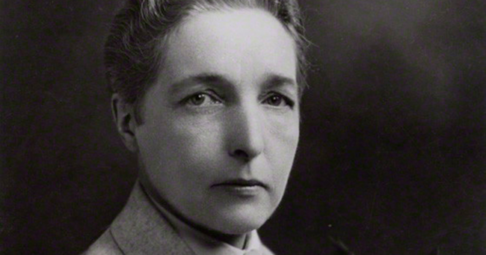 A black and white image of Radclyffe Hall, the author of the first censored lesbian novel.