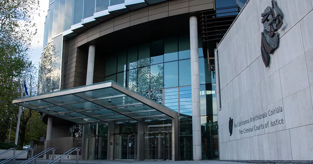 The Dublin Criminal Court of Justice where a man received a suspended sentence for assaulting a lesbian couple. The image shows the grey and glass exterior of the building.